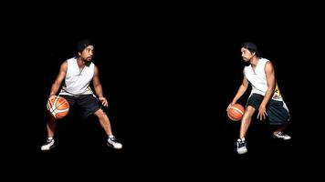 Gesture of Asian basketball player dribbling on black background. Basketball concept in Asia photo