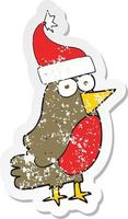 retro distressed sticker of a cartoon robin vector