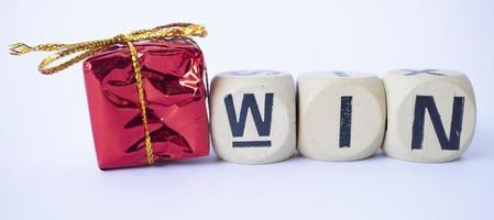 spelling win on wooden cubes photo