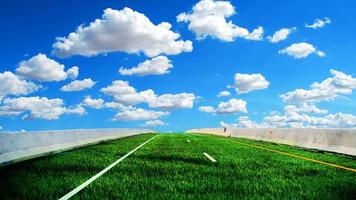 Green road concept without pollution. The road is made of grass on a bright day. photo