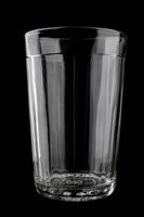 A faceted glass from the USSR is isolated on a black background. photo