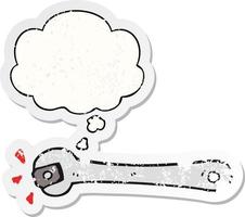 cartoon spanner turning nut and thought bubble as a distressed worn sticker vector