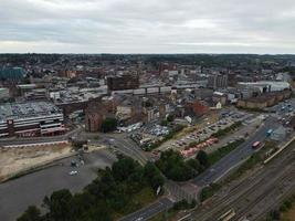 High Angle Footage of London Luton Town and Aerial view of Central Railway Station, Train Tracks of England UK photo