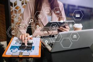 Digital marketing media website ad,social network, SEO, mobile app in virtual screen.business hand working on laptop with digital layer business strategy . photo