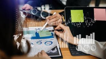 Investor analyzing stock market report and financial dashboard with business intelligence , with key performance indicatorsBusiness team meeting. Photo professional investor working new  project