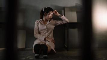 Asian woman sit Depression Standing by window and anxiety Copy space. photo