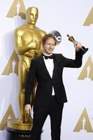 LOS ANGELES, FEB 28 - Laszlo Nemes at the 88th Annual Academy Awards, Press Room at the Dolby Theater on February 28, 2016 in Los Angeles, CA photo