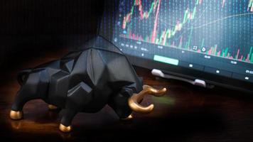 bull and chart for business or bull market trader concept photo