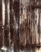 Dark grunge wood door with lock texture background vertical line, abstract background with copy space photo