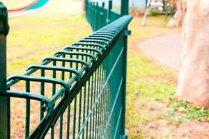 wired fence in park photo