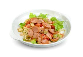 spaghetti noodles with sausage and tomatoes sauce in plate isolated on white background ,include clipping path photo