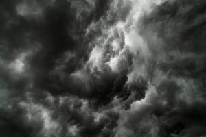 Rain clouds and black sky textured background photo