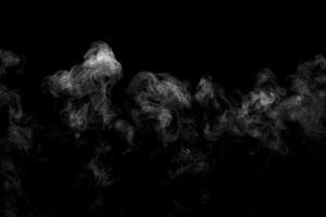 polvo abstracto o efecto de humo aislado sobre fondo negro foto