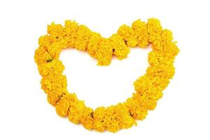 Yellow Marigold flowers wreath heart shape isolated on white background photo