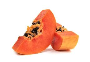 Ripe papaya slice isolated on white background photo