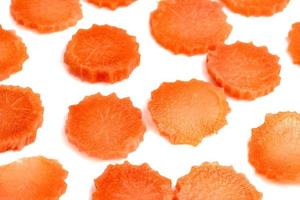 chopped carrot isolated on white background photo