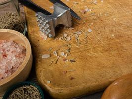 wooden chopping board  and kitchen equipment top view for food concept photo