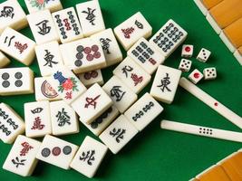 The mahjong on table ancient asian board game close up image photo