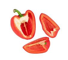 red chopped sweet bell pepper isolated on white background photo