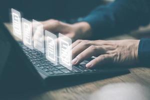 cyber security concept, man working on computer that is designed to protect networks, devices, programs and data from attacks, damage or unauthorized access. photo