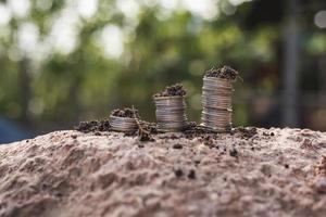 A pile of coins for finance and banking concept of saving money and growing finances photo