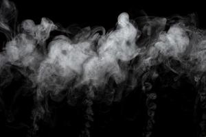 polvo abstracto o efecto de humo aislado sobre fondo negro foto