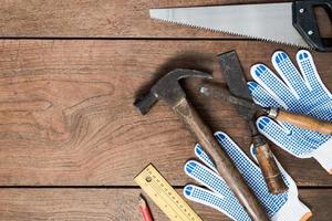 Many Tools on wooden table background. photo