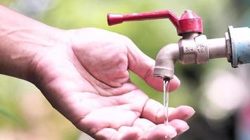 The concept of water crisis and despair from lack of clean water caused by drought. The faucet has no running water. video