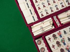 The mahjong on table ancient asian board game close up image photo