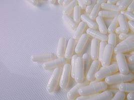 The white capsules image for medical and sci content photo