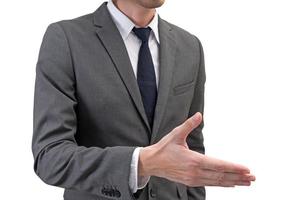 Businessman ready for handshake isolated on white background. photo