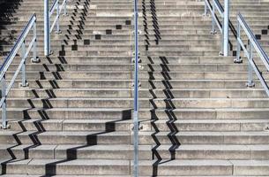 Different outdoor views on concrete and metal stairways. photo