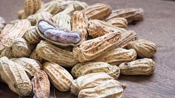 Boiled Peanuts on wooden table background.Selective focus photo