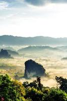 Landscape of sunshine on the morning mist at Phu Lang Ka, Phayao, Thailand photo