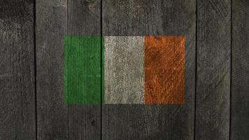 Ireland flag. Ireland flag on a wooden background photo