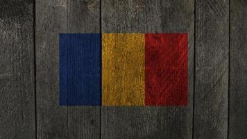 Moldova flag. Moldova flag on a wooden background photo