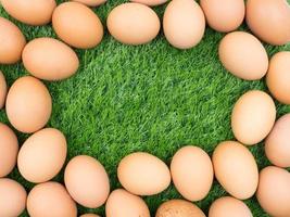 fresh eggs on grass background. photo