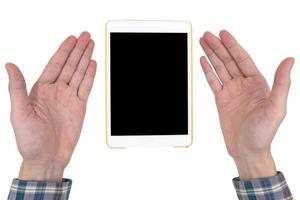 Male hands with a white tablet touch computer gadget with touch blank black screen isolated on a white background. photo