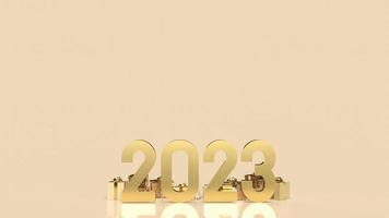 The 2023 gold number and gift box for celebration or happy new year concept 3d rendering photo