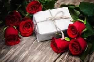 Red roses and gift box photo