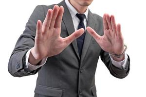 Businessman 's body language showing disgust gesture isolated on white background. photo