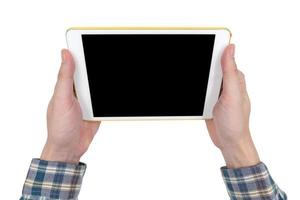 Male hands holding a white tablet touch computer gadget with touch blank black screen isolated on white background. photo