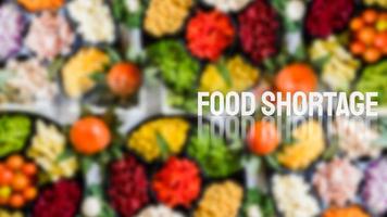 el texto blanco de la escasez de alimentos en la representación 3d de fondo de alimentos foto