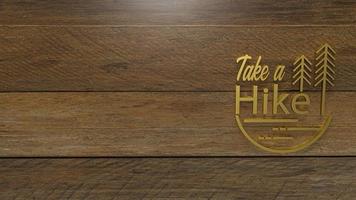 The gold take a hike word on wood plate for travel concept 3d rendering. photo