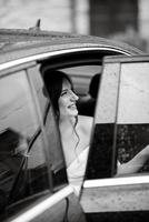 portrait of a young bride girl in a short white dress photo