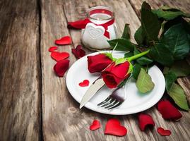 festive table setting for valentines day photo