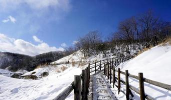 Noboribetsu onsen and walkway bridge snow winter photo