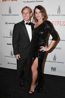 LOS ANGELES, JAN 11 - Bart Conner, Nadia Comaneci at the The Weinstein Company  Netflix Golden Globes After Party at a Beverly Hilton Adjacent on January 11, 2015 in Beverly Hills, CA photo