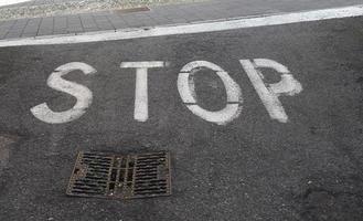 stop sign on tarmac photo