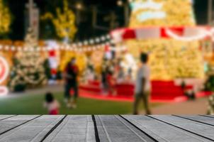 wood table top product empty counter abstract blur background person bokeh light festive decoration display vintage retro tone. photo